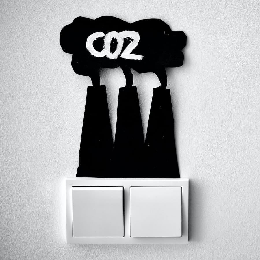 a black and white photo of a light switch